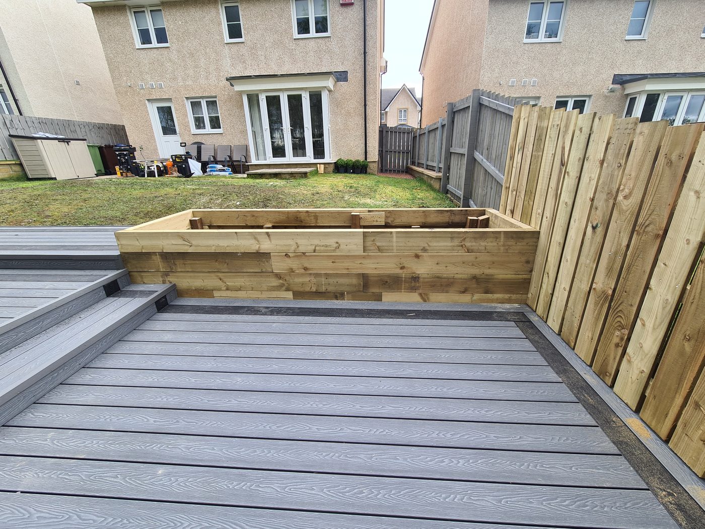 Composite decking with sleeper planter